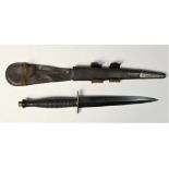 A WWII Third Pattern Fairburn Sykes fighting knife, with ribbed hilt, straight crossguard, blued