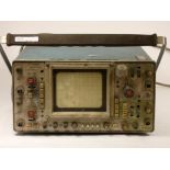 A Tektronix 466 100MHz Dual-Trace CRT Storage Oscilloscope, untested and sold without warranty