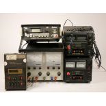 Three power supplies, including a Farnell ET 30/2, a Manson EP-613 and a Manson EP-920, together