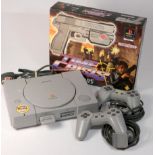 A Sony Playstation One console, two controllers, memory card and power cable, together with Namco