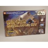 A Lego Mind Storms Droid Developer Kit, pieces still in bags (unsure if complete), comes with box,