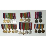 Six mounted groups of miniatures, WWI group of three, WWII group of four including Air Crew France