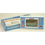 A Nintendo Game and Watch (Super Mario Bros.) single/wide screen handheld game c.1988 (serial number