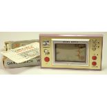 A Nintendo Game and Watch (Snoopy Tennis) single/wide screen handheld game from c.1988 (serial