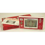 A Nintendo Game and Watch (Mario's Cement Factory) single/wide screen handheld game c.1983 (serial