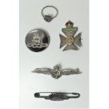 A silver RAF sweetheart brooch, three other silver sweetheart brooches and a Merchant Navy ring