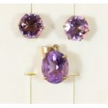 A 9ct gold amethyst pendant and ear stud suite, 3.3gm