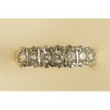 A 9ct gold brilliant cut diamond ring, stated weight 0.50cts, sizing cracked on shank, M, 2.5gm