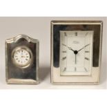 Two silver R.Carr Clockmaker, England, bedside clocks.