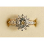 A 9ct gold aquamarine and diamond cluster ring, L 1/2, 2.7gm