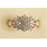 A 9ct gold diamond cluster ring, stated weight 0.50cts, N 1/2, 2.6gm