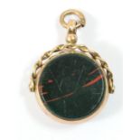 A 9ct rose gold swivel seal, Birmingham 1919, one side bloodstone the other plain