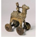 A brass Indian temple toy on wheels