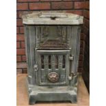 A French cast iron green enamel stove by Godin no.411