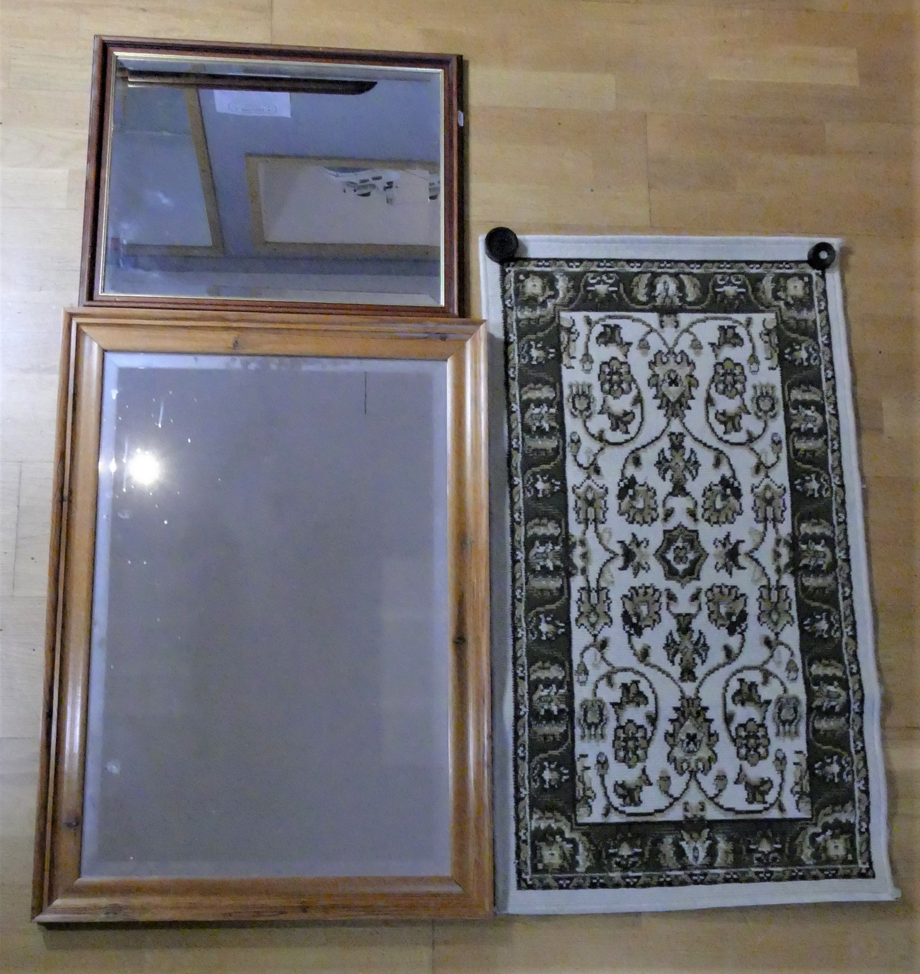 A bevelled edge mirror 87 x 61, together with a smaller example 59 x 48 cm and a Heritage Imperial
