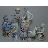 A Lladro figure of a clown with balloons impressed mark 5811, another of a boy with a polar bear,