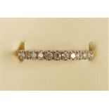 A 9ct gold and brilliant cut diamond ring, stated weight 0.25cts, M, 1.3gm