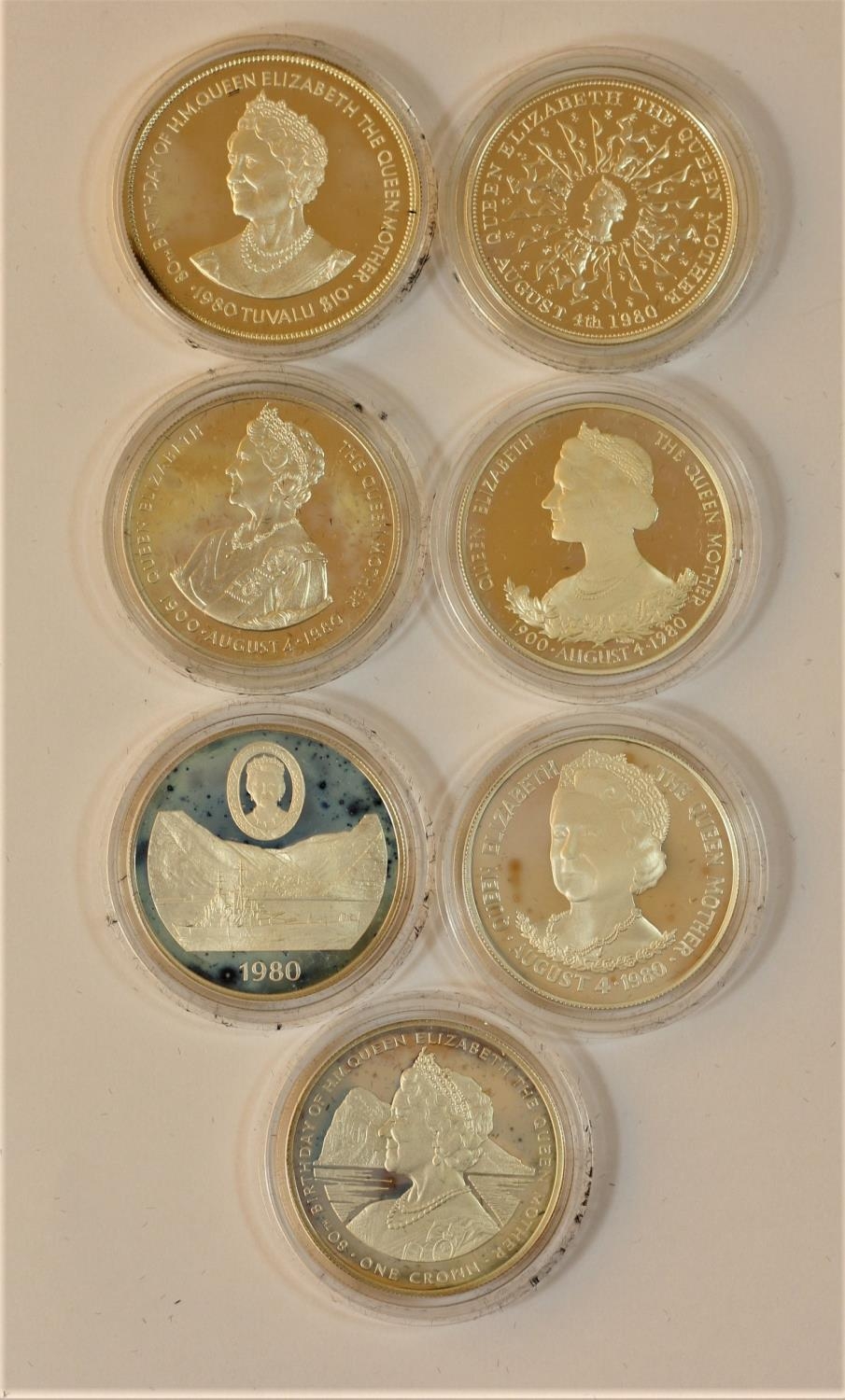 A Queen Elizabeth, the Queen Mother, 80th birthday seven silver coin set, certificate, case, 197gm - Image 2 of 2