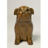 A novelty inkwell, in the form of a soft wood Bulldog, opening to reveal inkwell, missing one