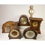 A collection of mantel clocks to include, a Swiza 8 day mantel clock, Angelus and other wooden