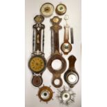 A collection of oak cased mantel clocks and barometers (2)