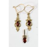 A 9ct gold garnet ear ring and pendant suite