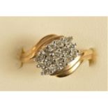 A 9ct gold brilliant cut diamond cluster ring, K, 2.1gm