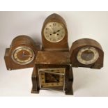 A collection of oak cased mantel clocks (2)