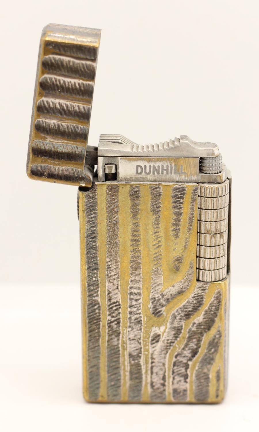 A Dunhill 70 rollagas lighter, c.1970's, with textured body, booklet, pouch and box - Image 2 of 3