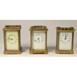 Three brass manual wind carriage clocks, unmarked.