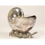 A Victorian electroplated spoon warmer, modelled as a Nautilus shell on a rocky outcrop, 16cm.