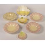 A Royal Worcester set of four shell bowls, pattern G 180, diameter 12cm, a small shell bowl, G677,
