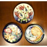 Three Moorcroft limited edition tube lined plates, by Emma Blossons, Queen Elizabeth Golden Jubilee,