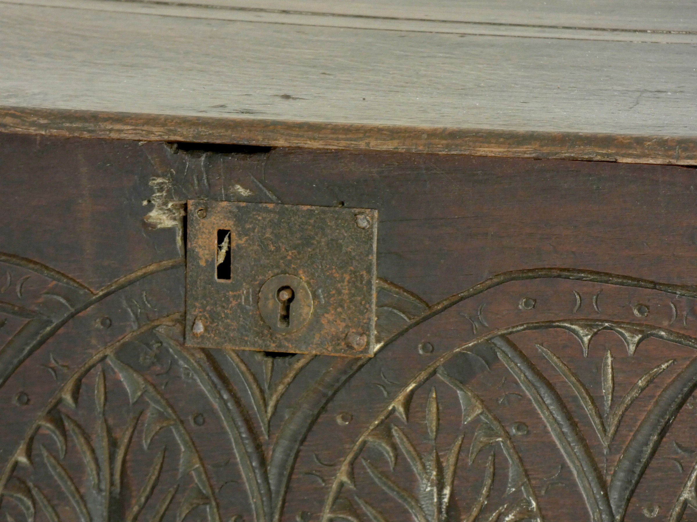 An 18th century and later oak bible box with carved front panel, raised on a later bobbin stand. - Image 3 of 4