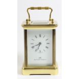 Matthew Norman, a brass carriage time piece, the white enamel dial with Roman numerals, the 11 jewel