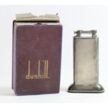 Dunhill, a vintage silver plated petrol table lighter, the arm with Reg No 737438, engine turned