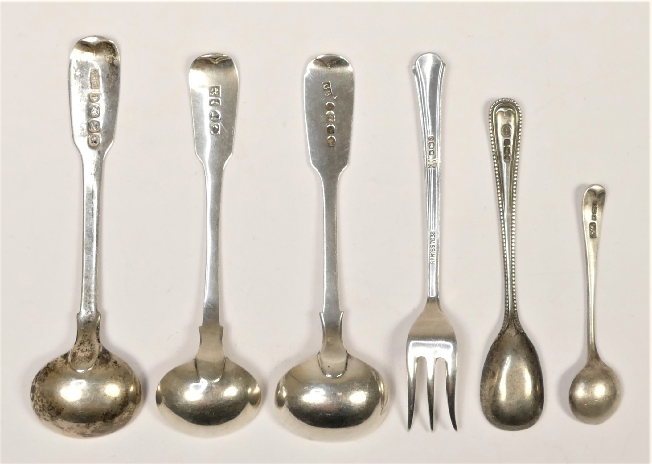 Three George III and later mustard spoons, a pickle fork and two other spoons, 51.5gm - Image 3 of 4