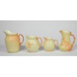 A Locke & Co, Worcester cream jug, 502A, with shell border, 10.5cm and three other Lock & Co cream