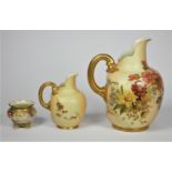 A Royal Worcester porcelain ewer, model 1094, c.1902, painted with flowers on a blush ivory