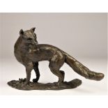 Linda Frances (contemporary), a cast bronze of a fox looking back, signed LF, 18 x 8 x 12cm. Linda