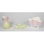 A Royal China Works trefoil shell bowl, model 69, in pink, a vase, model G59, and maple leaf dish,