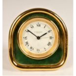 Cartier, Paris, a brass and green enamel 7504 travel alarm clock, c.1990, the white enamel dial with