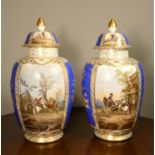 A large pair of 19th century Dresden porcelain, urns with covers, underglaze blue Augustus Rex mark,