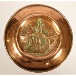 Newlyn School, an Arts and Crafts embossed copper charger, decorated with a galleon, plain fold over