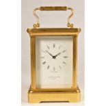 Mappin & Webb, London, a brass 1/2 hour striking carriage clock, the white enamel dial with Roman