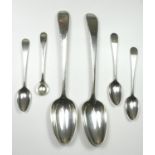 Hester Bateman, a George III silver pair of feather edge table spoons, London 1772, a set of three