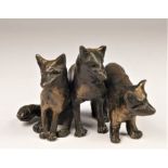 Linda Frances (contemporary), a cast bronze group of three fox cubs, signed LF, 9 x 9 x 6cm. Linda