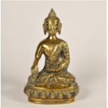 A Thai bronze Buddha, with crossed legs and right hand out stretched, 20cm