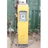 An Avery Hardoll petrol pump with half gallon face, pump and hose, patent no.410.13, 183 x 56 cm