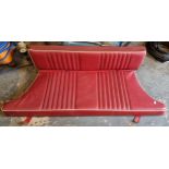 An MGB GT rear two piece seat in red vinyl with white piping